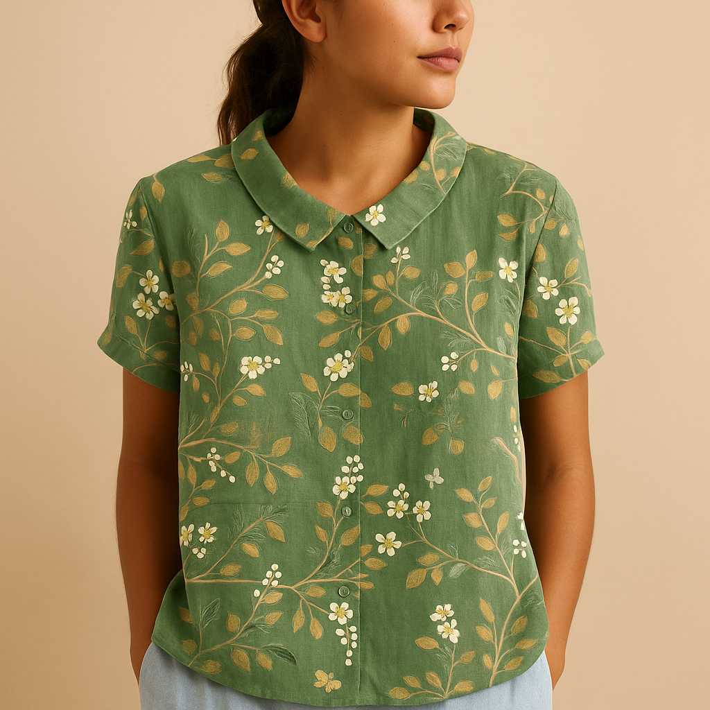 Women’s airy floral print blouse with a loose fit and breathable design, ideal for casual wear on warm days indoors or outdoors.