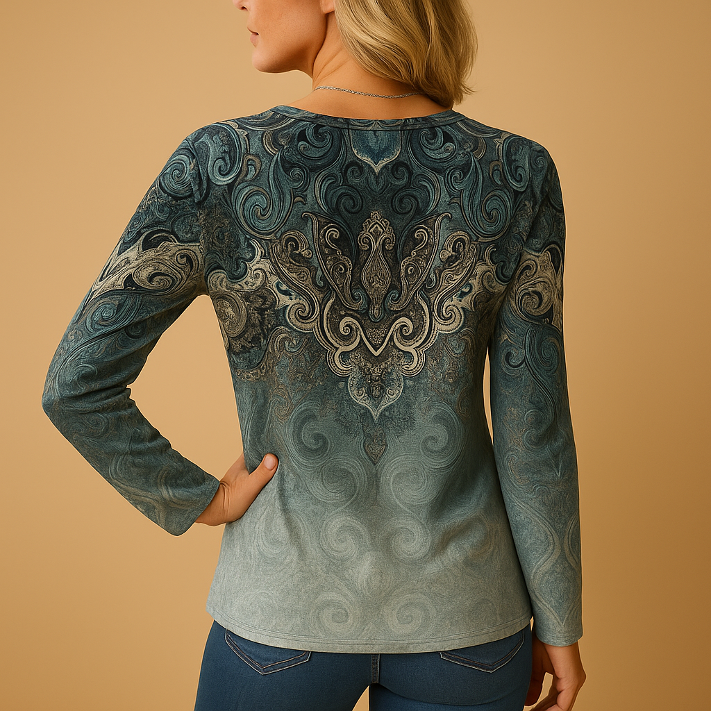 Women’s airy summer blouse with a breathable fit and feminine design, ideal for warm days, holidays, and casual summer occasions.