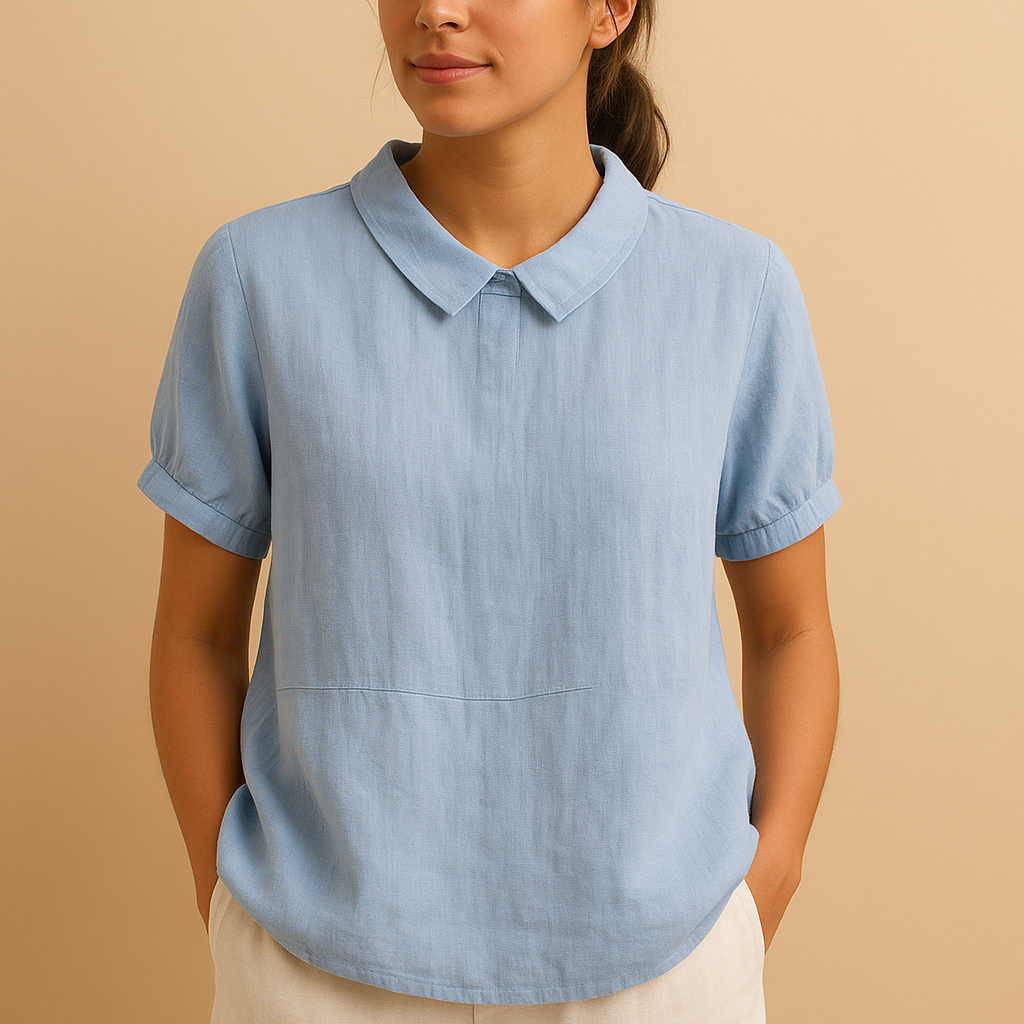 Elegant tailored blouse for women with a classic design, suitable for office outfits, formal occasions, and smart casual wear.