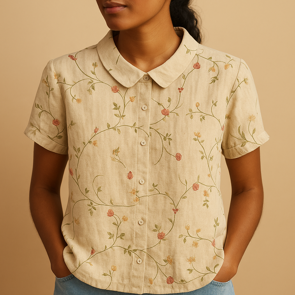 Women’s airy floral print blouse with a loose fit and breathable design, ideal for casual wear on warm days indoors or outdoors.
