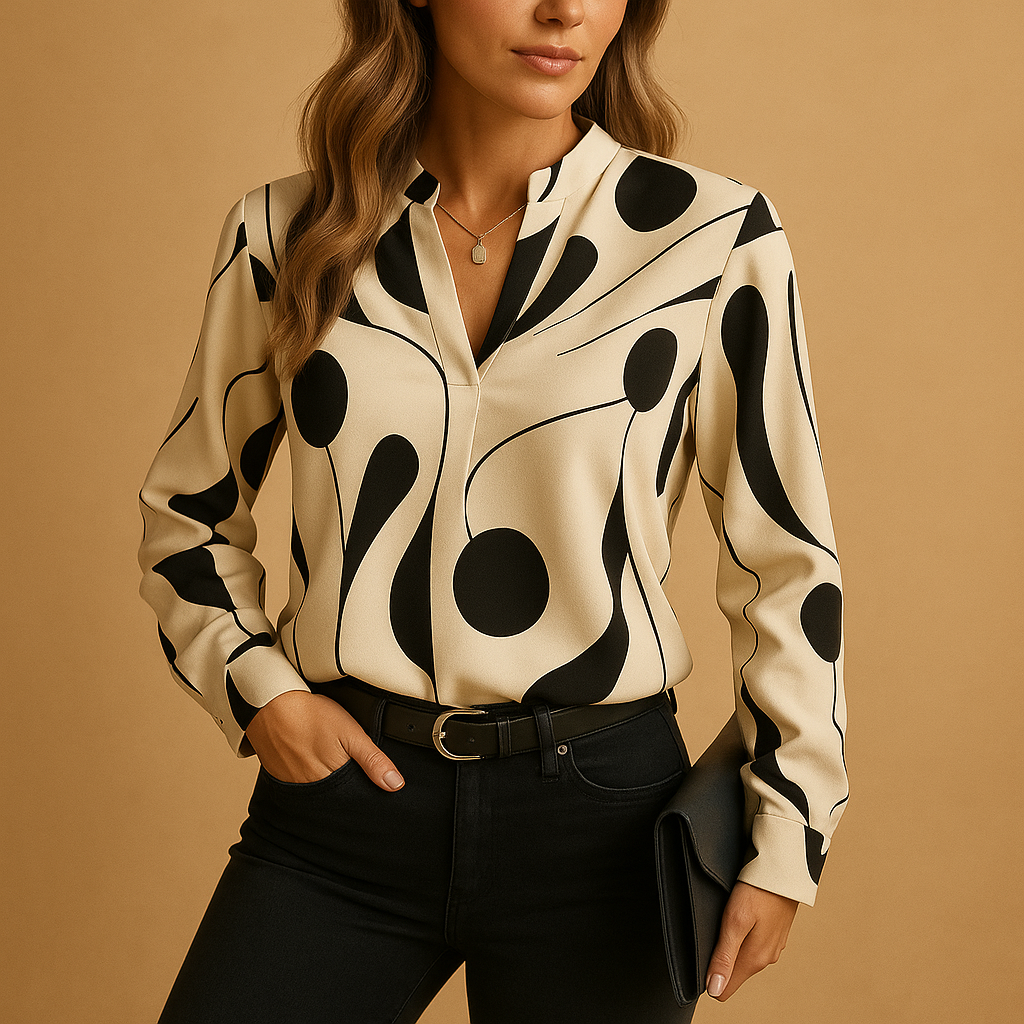 Women’s elegant printed blouse with a smooth fit and refined design, suitable for casual outfits and formal occasions.